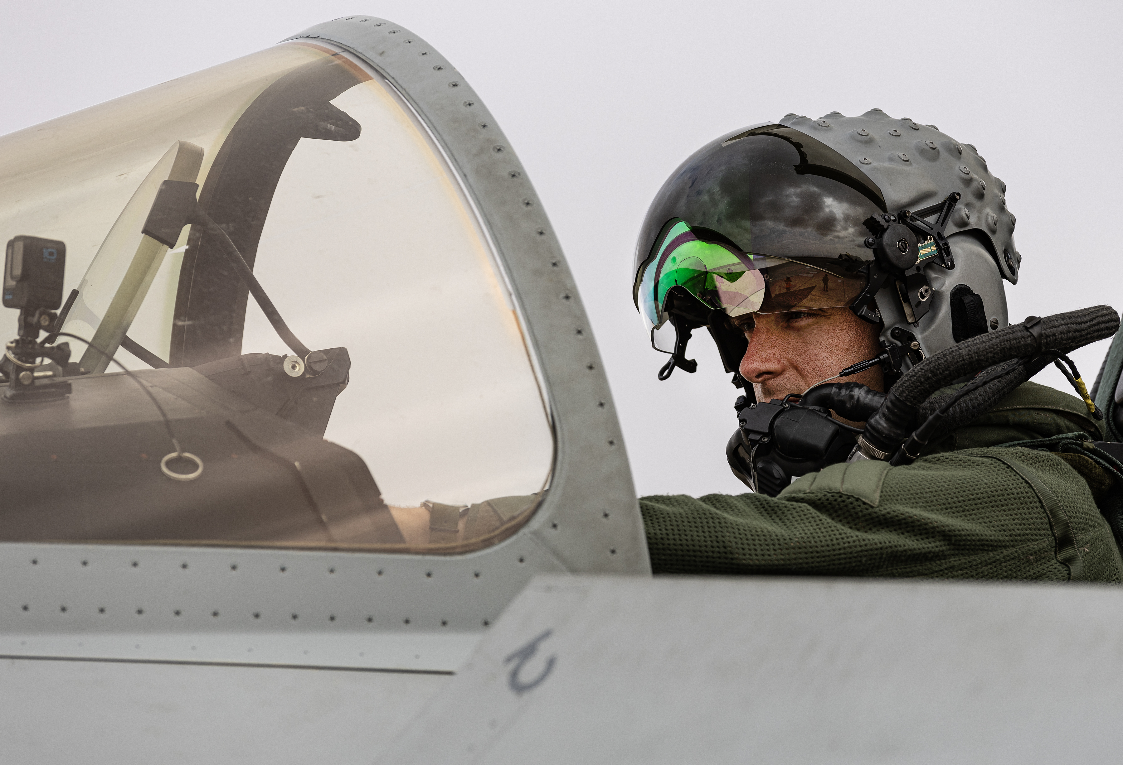 Image shows RAF Typhoon pilot sitting in the cockpit.